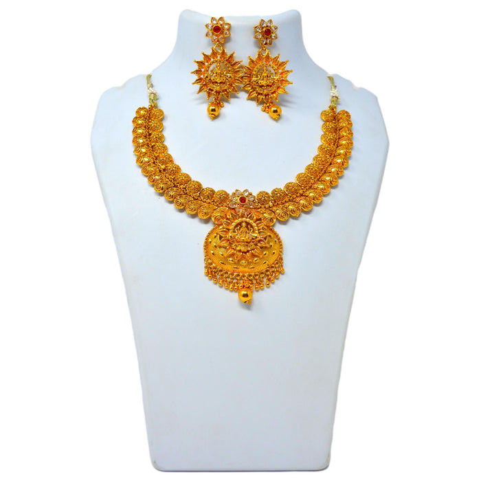 Plain Gold Laxmi Pendant Necklace set On Mannequin