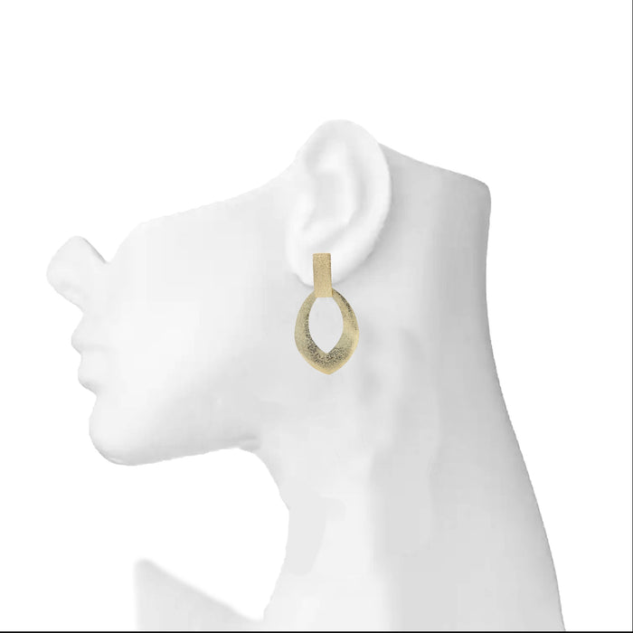 Modern Plain Gold Earrings On Ear