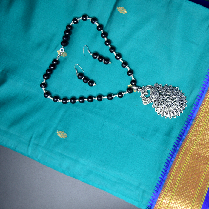 Black Mani Oxidised Peacock  Pendant Necklace Set